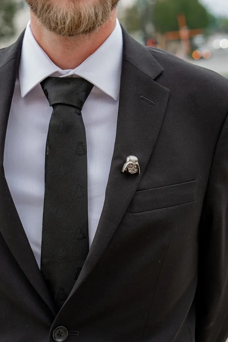 groom and a custom made Darth vader pin