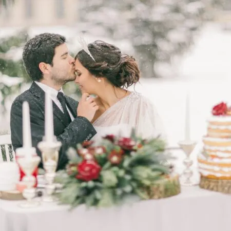 winter wedding couple in the snow
